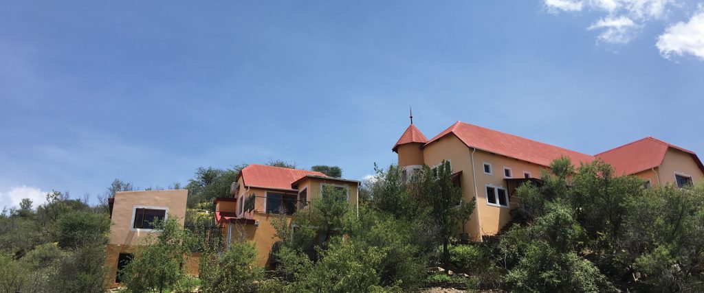 Nestled against a hillside on the eastern outskirts of the capital, there’s a little yellow castle.  From the outside it appears to be reminiscent of something you’d find in a European countryside. When you pass through the front door though, all similarities with the northern continent fade away and you are met by the style and ambiance of an African bush safari.